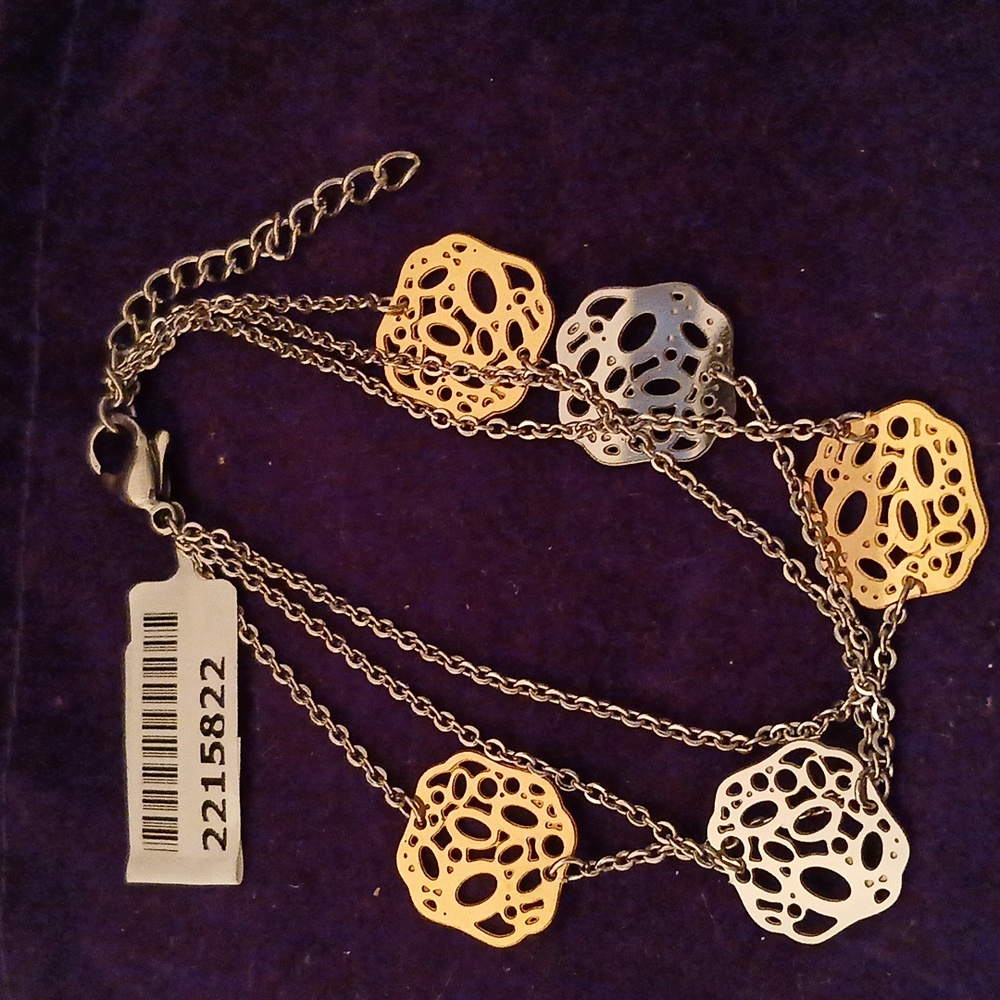2215822-1.  Three Tier YG & Stainless Bracelet